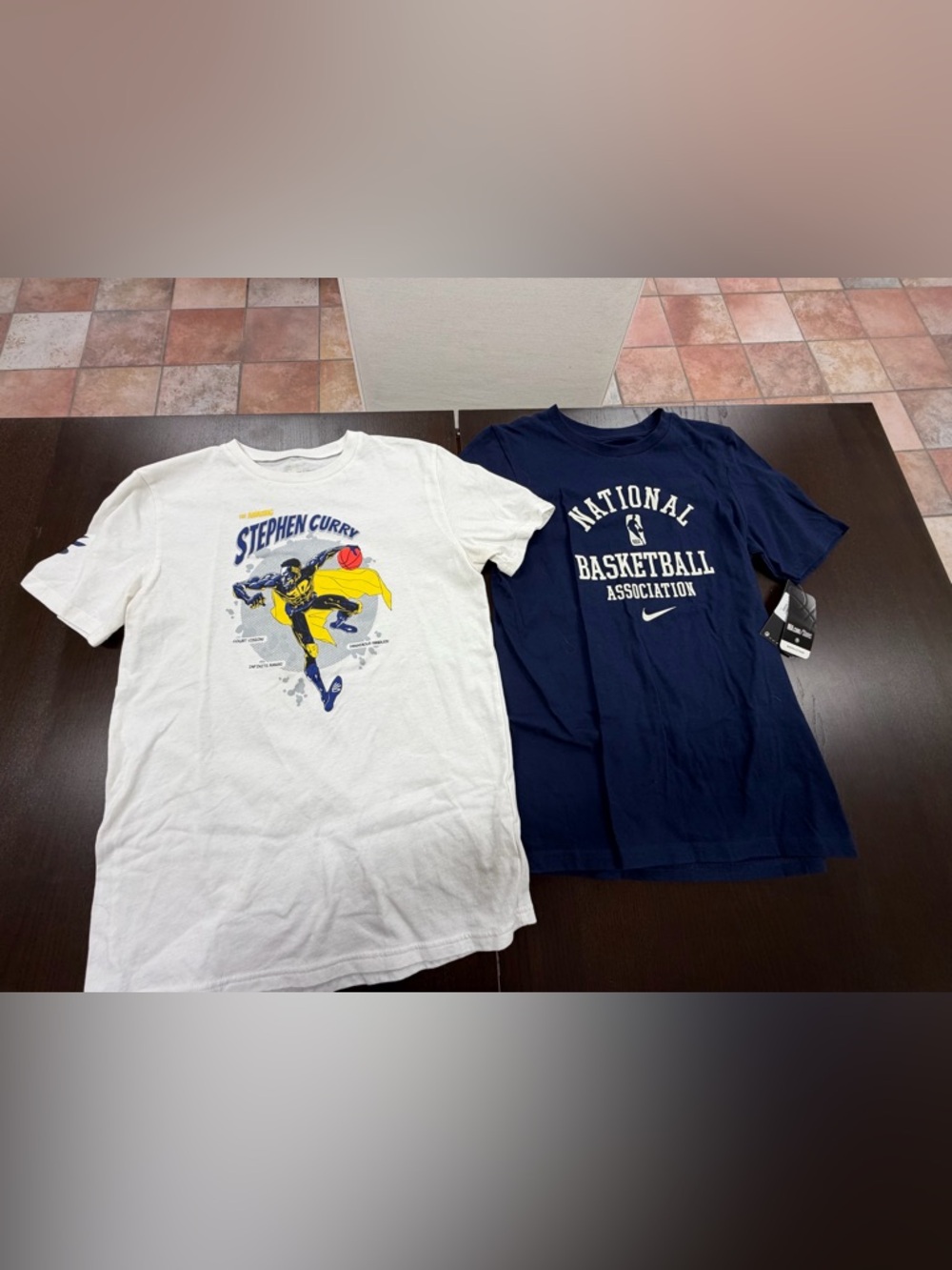 Two youth size tee shirts

• youth large
• youth extra large